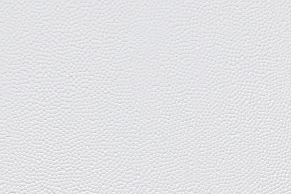 La superficie plana tendido primer plano de un blanco de espuma de poliestireno ligero. Fondo de textura abstracta moderna de moda —  Fotos de Stock