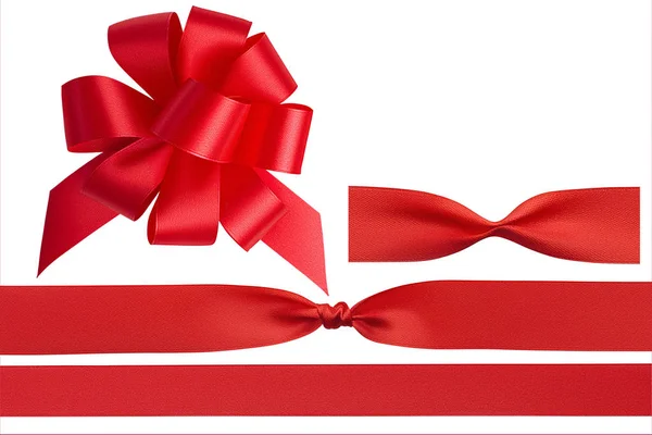 Set for design of a large red unusual bow, a red straight perfect satin ribbon and two satin ribbons with different knots isolated on a white background. Clipping path. — Stock Photo, Image