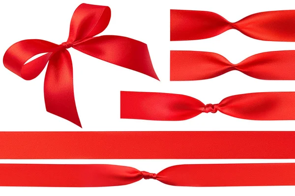 Sidovy av en klarröd enkel handgjord båge och en uppsättning röda satinpresentband och fyra typer av knutar isolerade på en vit bakgrund. Närbild designelement. Klippbana — Stockfoto