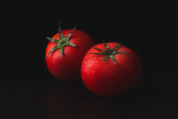 Two Fresh Ripe Red Tomatoes Green Sprig Water Droplets Dark — Stock Photo, Image