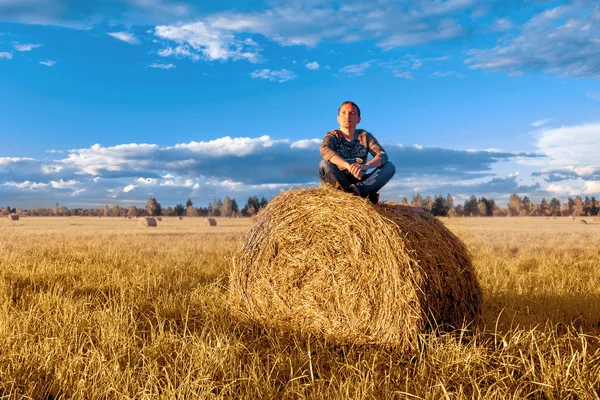 Young Man Sitting Haystack Blue Sky Clouds — Stock Photo, Image