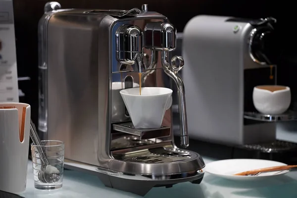 Coffee preparation. chrome coffee machine. two coffe machines — Stock Photo, Image