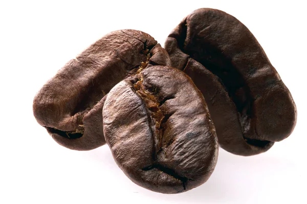 Three coffee beans on white background. isolate. close up — Stock Photo, Image