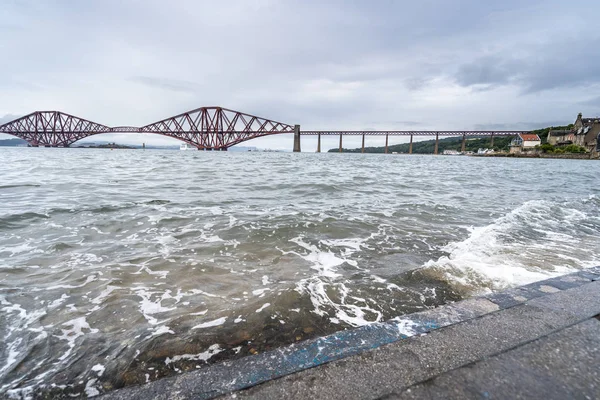 The Forth Bridge is a cantilever railway bridge across the Firth of Forth in the east of Scotland