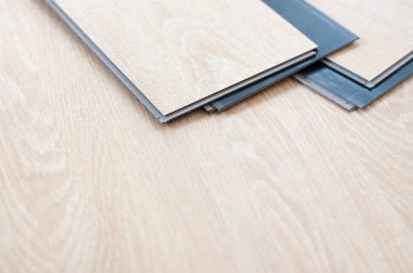  Ev eşyaları için malzeme tasarımı. Metin arkaplanı için kopyalanma alanı. Tahta yüzey örneği. Plywood, Laminate, kaplama. Plastik ahşap döşeme. Ev dekorasyonu için plastik ahşap döşeme.. 