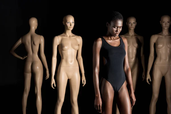 Young African American Woman Swimsuit Standing Front Mannequins Looking Black — Stock Photo, Image