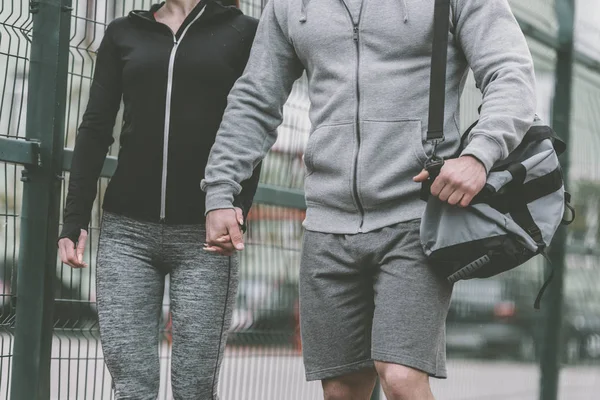 Cropped Image Sportive Couple Holding Hands Walking Sports Ground — Stock Photo, Image
