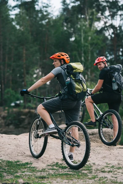 Active Young Trial Bikers Riding Forest Cloudy Day — Stock Photo, Image