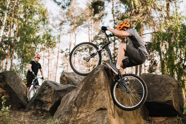 Extreme Trial Bikers Riding Rocks Outdoors — Stock Photo, Image