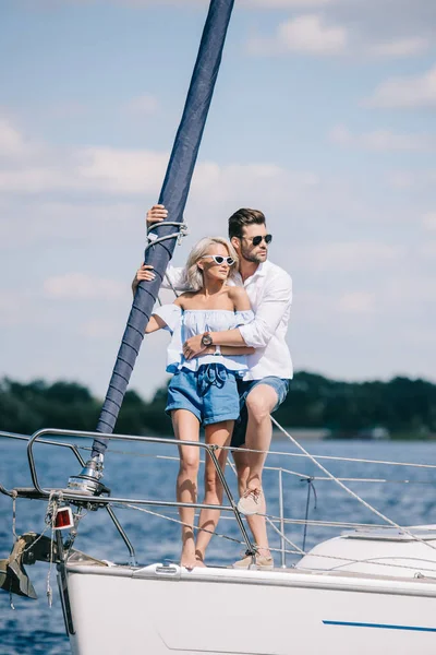 Beautiful Young Couple Sunglasses Looking Away While Hugging Yacht — Stock Photo, Image