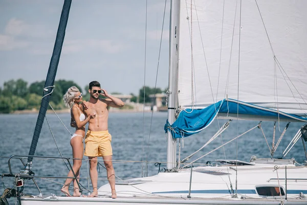 Beautiful Young Couple Swimwear Sunglasses Standing Together Yacht — Stock Photo, Image