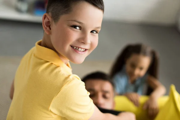 Children Closing Father Mouth Black Tape Home Son Looking Camera — Free Stock Photo