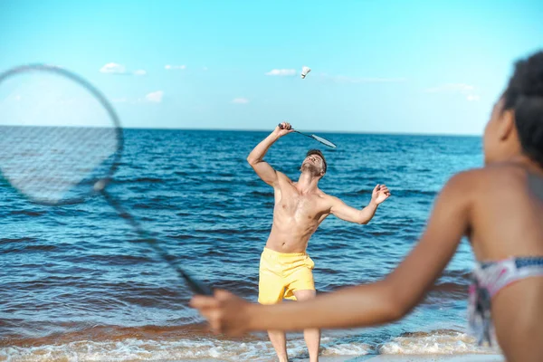 Selective Focus Multicultural Couple Playing Badminton Sandy Beach — Stock Photo, Image