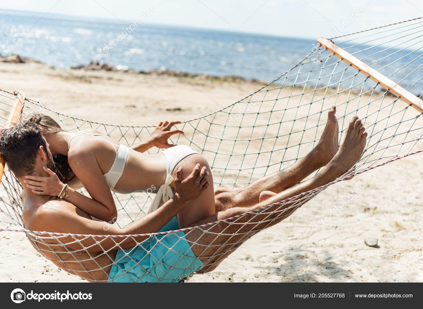 depositphotos_205527768-stock-photo-couple-lovers-kissing-resting-hammock.jpg