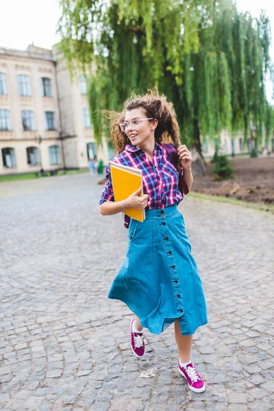 Smiling Student Eyeglasses Notebooks Running Street — Stock Photo, Image