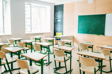 interior of empty modern classroom at school clipart