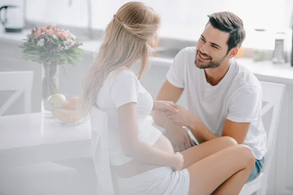 Pregnant Woman Husband Holding Hands Table Home — Stock Photo, Image