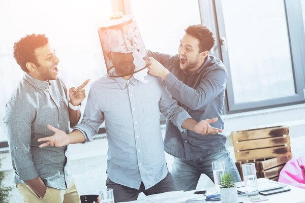 portrait of young business team having fun in office, business teamwork