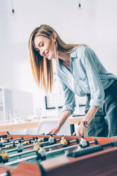 Young Attractive Businesswoman Playing Table Football Modern Office — Free Stock Photo