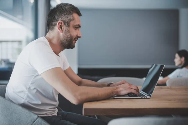 Side View Smiling Male Freelancer Using Laptop Blank Screen Home — Stock Photo, Image