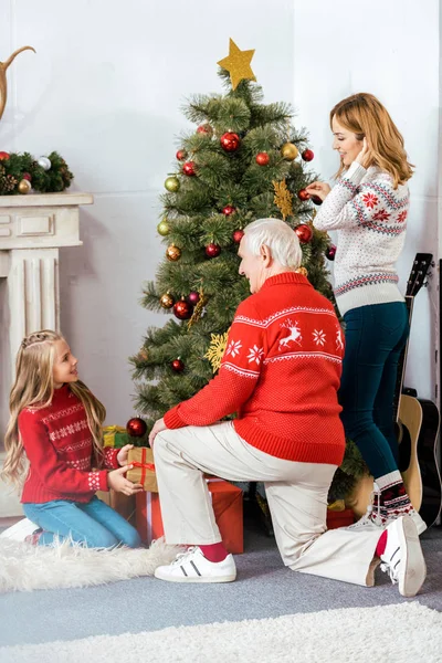 Happy Little Child Decorating Christmas Tree Mother Grandfather — Stock Photo, Image