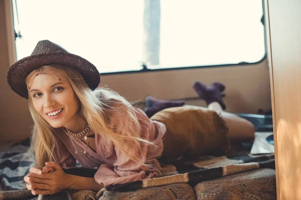 Smiling Hippie Girl Lying Camper Van — Free Stock Photo