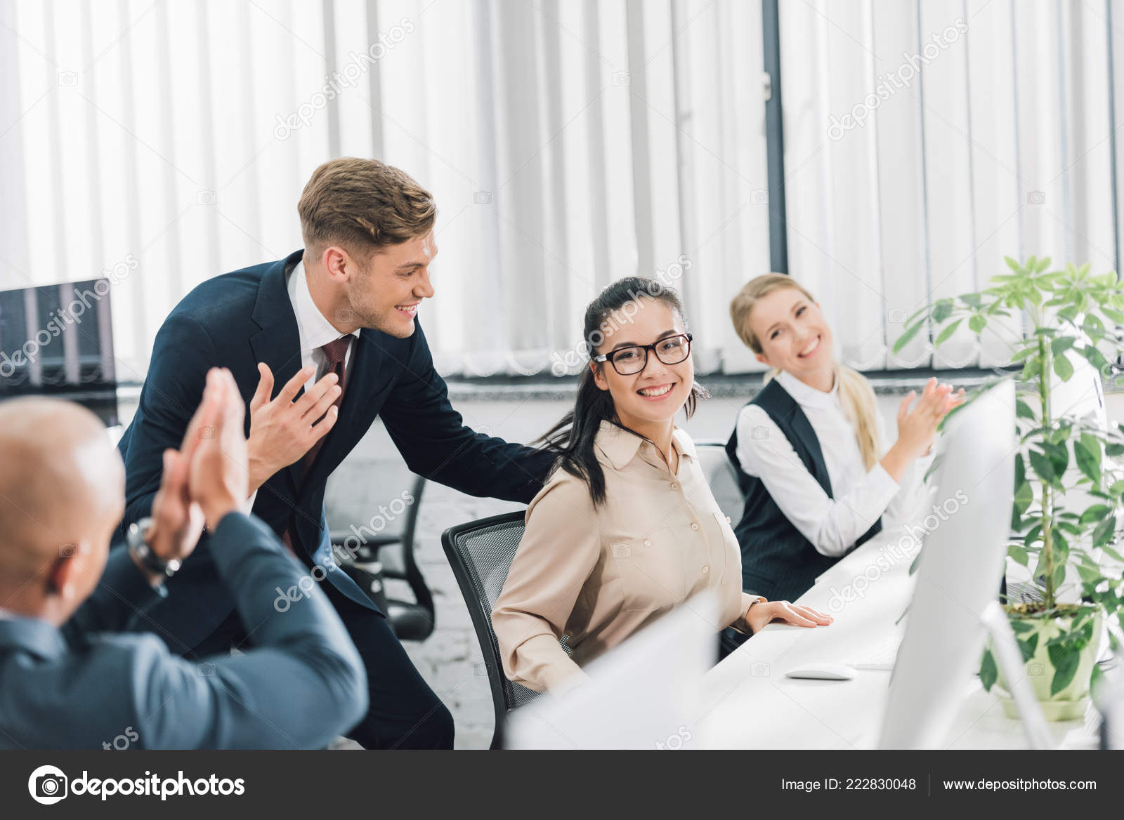 Smiling Businesswoman Greeting A Colleague On A Meeting Stock Photo -  Download Image Now - iStock