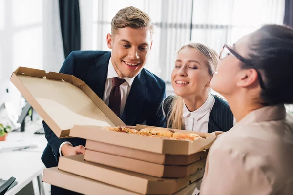 Happy Young Business Colleagues Smelling Tasty Pizza Office — Stock Photo, Image