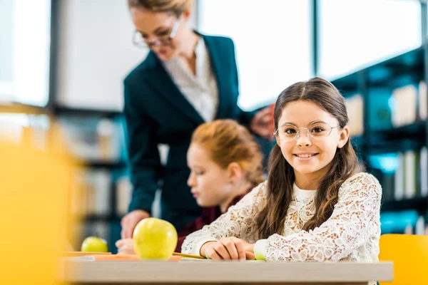 Beautiful Schoolkid Smiling Camera While Studying Classmate Teacher Library — Stock Photo, Image