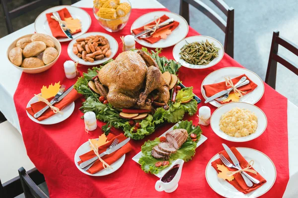 Beautiful thanksgiving table with various delicious dishes — Stock Photo