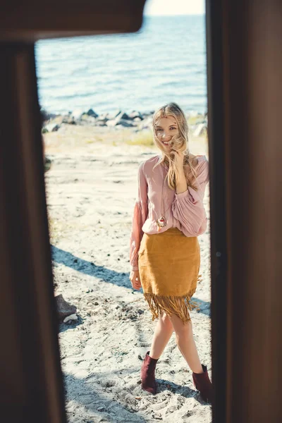 Beautiful hippie girl outdoors, view from camper van — Stock Photo