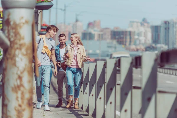 Tourists walking on street while traveling together — Stock Photo