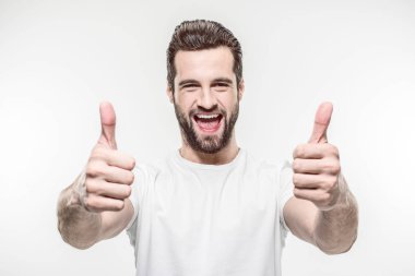 happy young man showing thumbs up isolated on white clipart