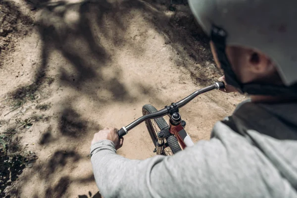 Overhead view of cyclist riding bike — Stock Photo