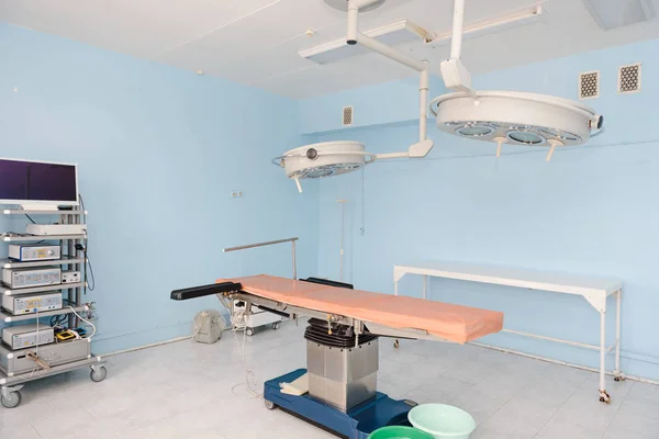 Operating table. Cabinet for operations. Hospital room Surgical table.