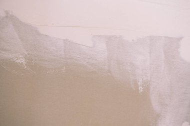 Duvardaki macun. Gypsocorton macun. Evin duvarlarda tamir.