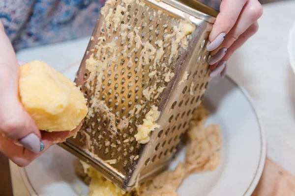 Electric Grater Cuts Raw Potatoes Stock Photo, Picture and Royalty Free  Image. Image 121450696.