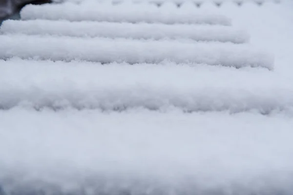 Die Textur des Schnees. Schnee aus nächster Nähe. — Stockfoto