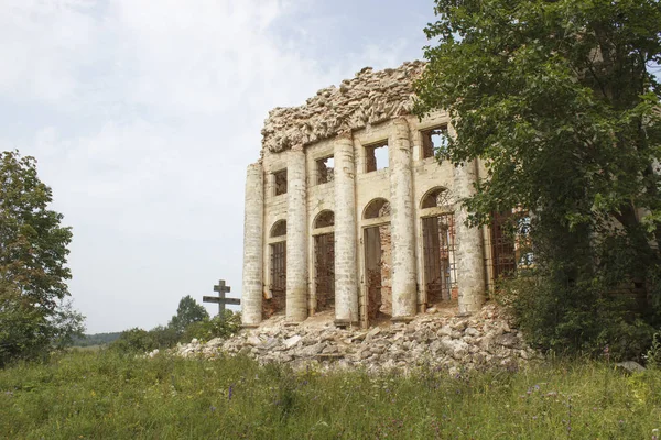 A ruined church of red brick