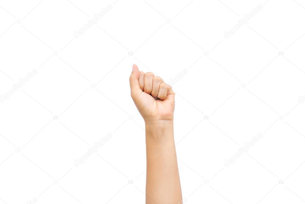 Woman hand showing fist as rock paper sign on white background