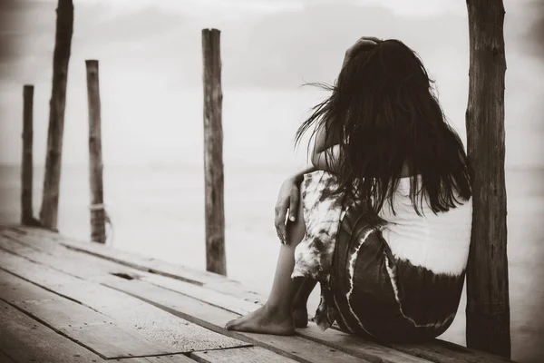 Black White Sad Lonely Woman Sitting Alone Wooden Bridge Sea — стоковое фото