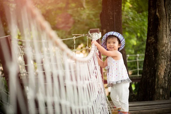 Happy Little Girl Playing Climbing Rope Bridge Adventure Park Colorful — Stock Photo, Image