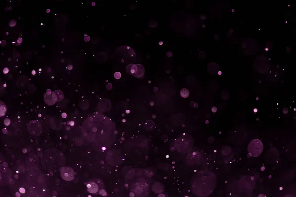 Siyah arka plan ile soyut pembe veya mor bokeh