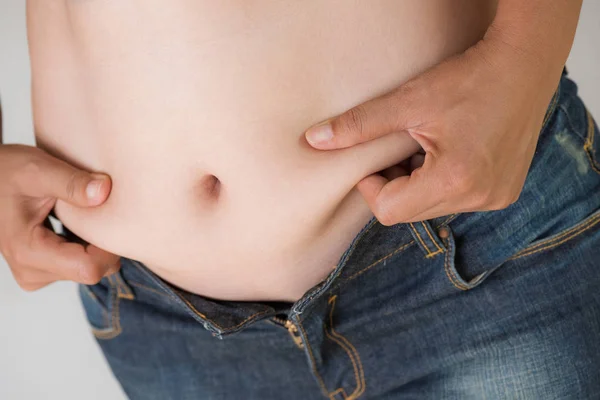 Uma Mulher Gorda Segurar Própria Gordura Barriga Estilo Vida Mulher — Fotografia de Stock