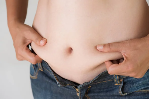 Uma Mulher Gorda Segurar Própria Gordura Barriga Estilo Vida Mulher — Fotografia de Stock