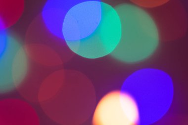 Renkli soyut bokeh ışık doku desen arka plan geceleri.