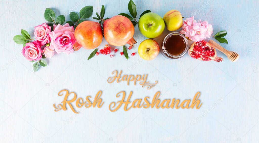 Rosh Hashanah (Jewish New Year holiday), Concept of traditional or religion symbols on pastel blue background.