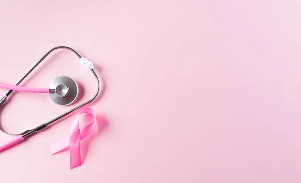 Nastro Rosa Stetoscopio Sfondo Rosa Pastello Simbolo Consapevolezza Del Cancro — Foto Stock