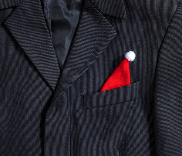 Men's dark jacket in small stripes collar pocket sleeve in the pocket cap red Santa Claus — Stock Photo, Image