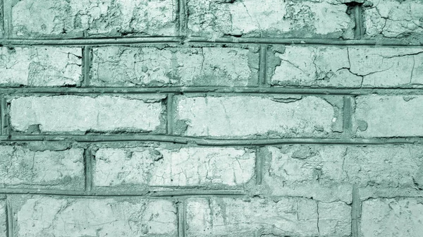Старая имитация кирпичной стены из бетона с трещинами — стоковое фото